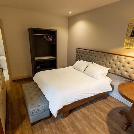 Cosmopolitano Hotel Boutique 산타 크루즈 드 라 시에라 외부 사진 A bedroom at the hotel