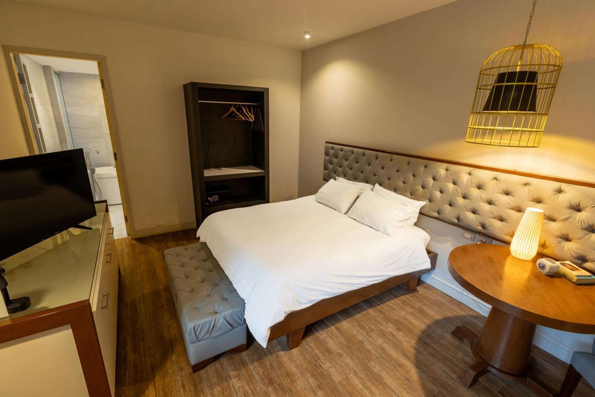 Cosmopolitano Hotel Boutique 산타 크루즈 드 라 시에라 외부 사진 A bedroom at the hotel